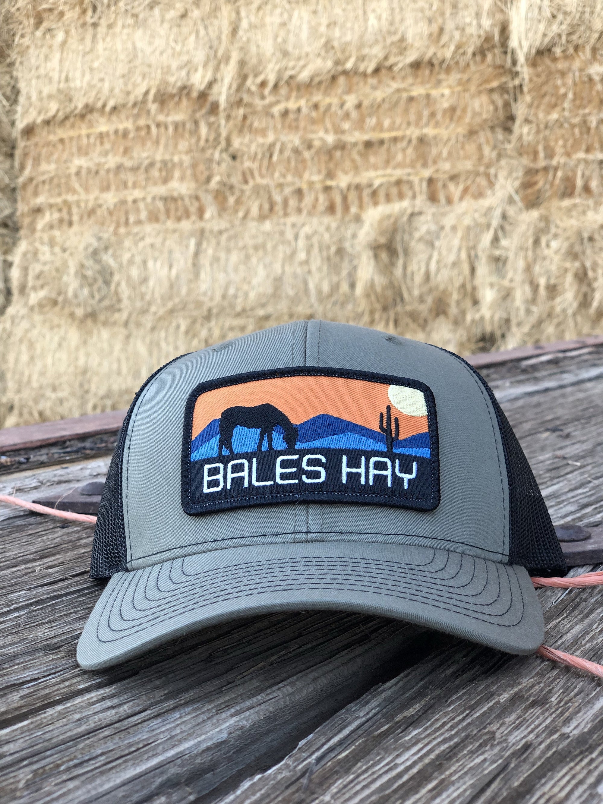 This hat is both well-made and comfortable to wear that features the first patch we ever designed! It represents the horses we feed, and the landscape we live in.  
