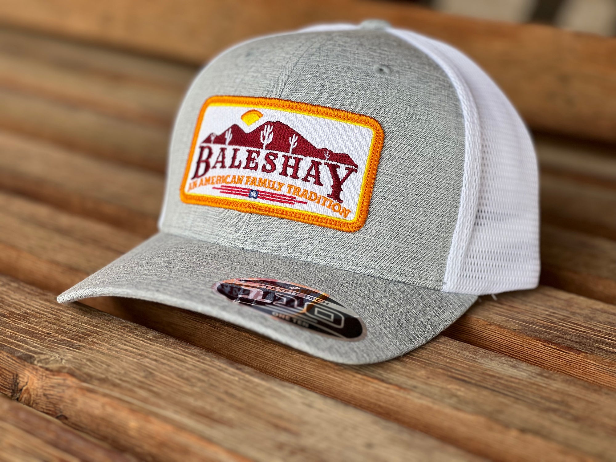 Heather Grey Black Mesh Hat featuring our Bales Hay Patch with the mountain scape of Buckeye Arizona!