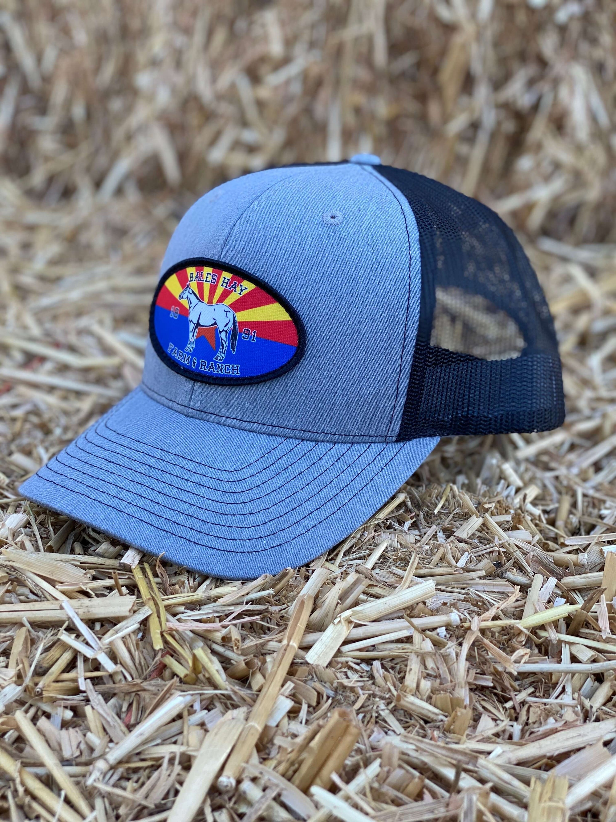 This hat is both well-made and comfortable to wear that features the Arizona flag as the background of our oval patch and a custom stitched Bales quarter horse. 