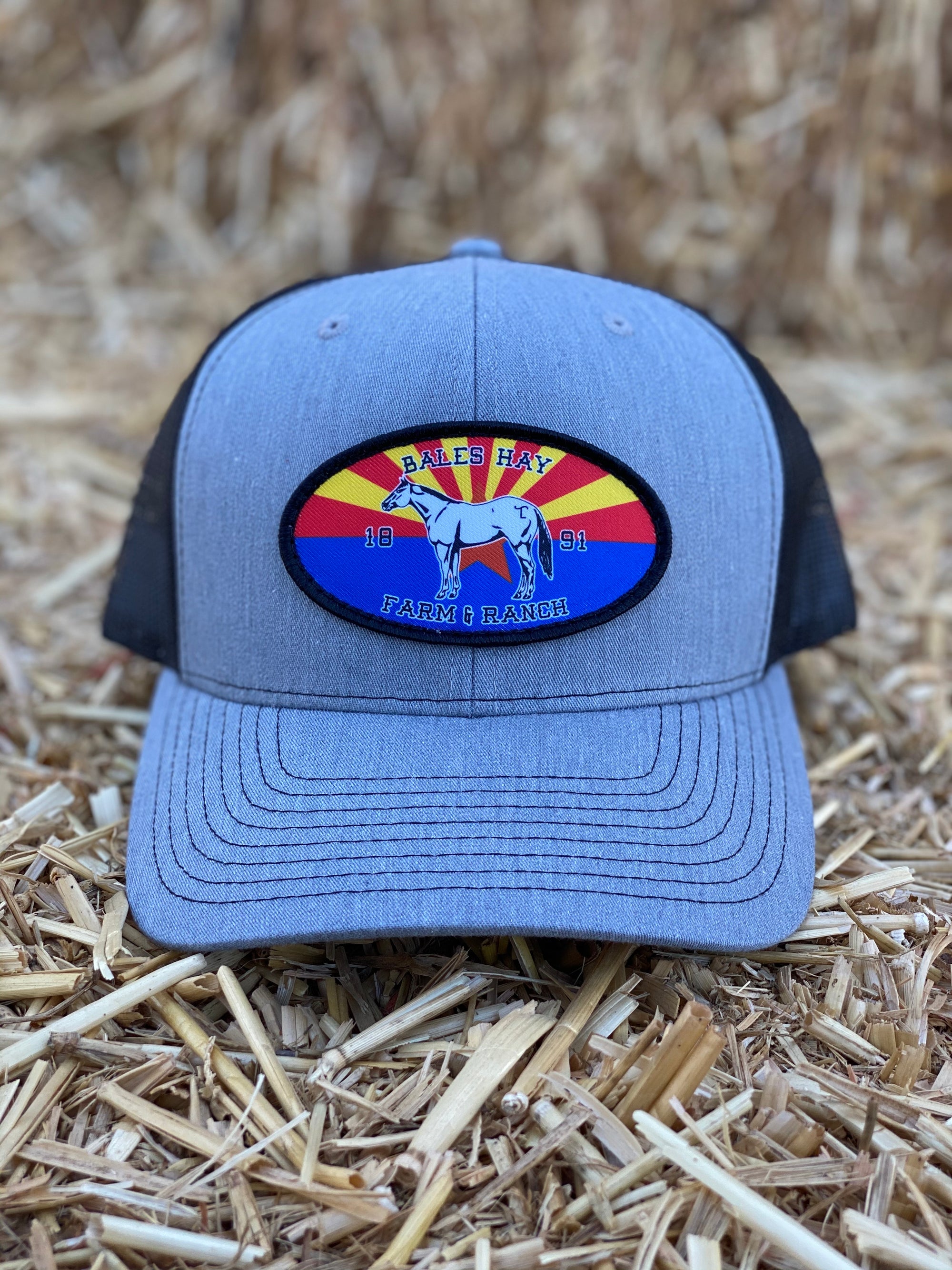 This hat is both well-made and comfortable to wear that features the Arizona flag as the background of our oval patch and a custom stitched Bales quarter horse. 